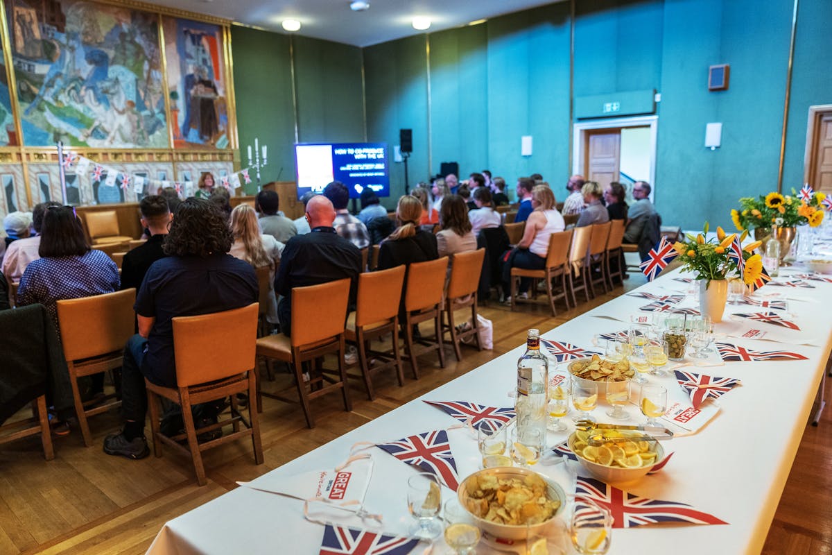 <i>‘How to Co-produce with the UK’ and British reception at the Haugesund City Hall. Photo: Grethe Nygaard.</i>