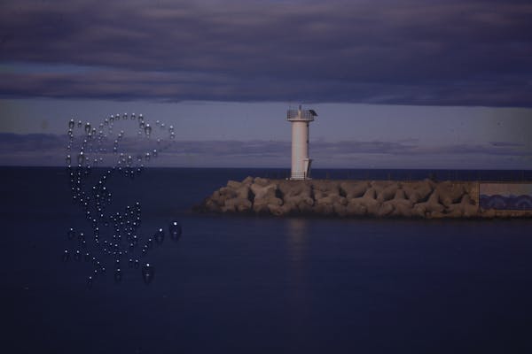 Droplet fish and lighthouse